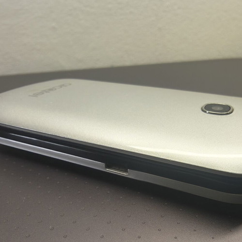 Alcatel mobile phone, silver, memory card slot