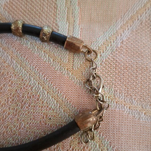 Women's bracelet used rubber with cross charm