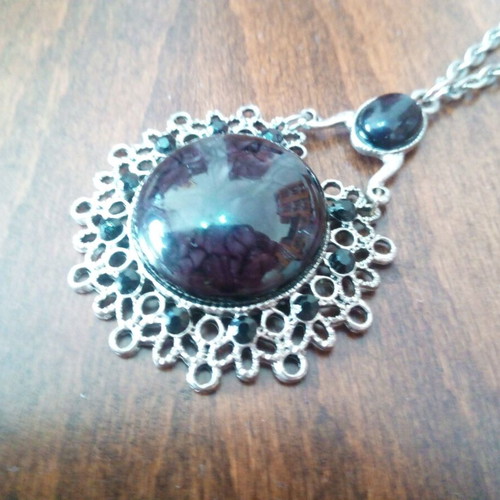 Pendant with glass cabochon in dark brown color, like new