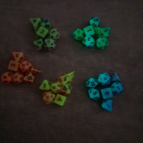 5 sets of glow in the dark D&D dice