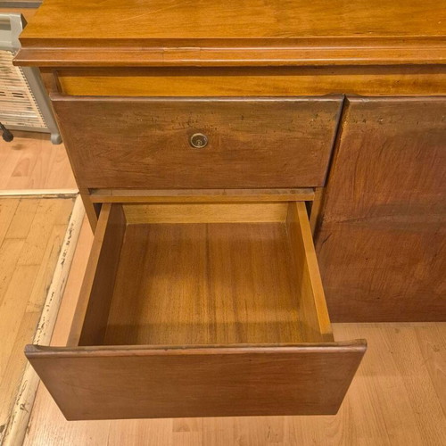 Corner desk with glass surface used, wooden base and storage