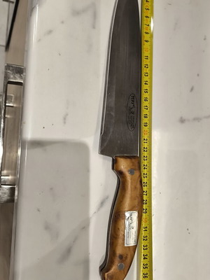 Chef knife used with stainless German steel and wooden handle
