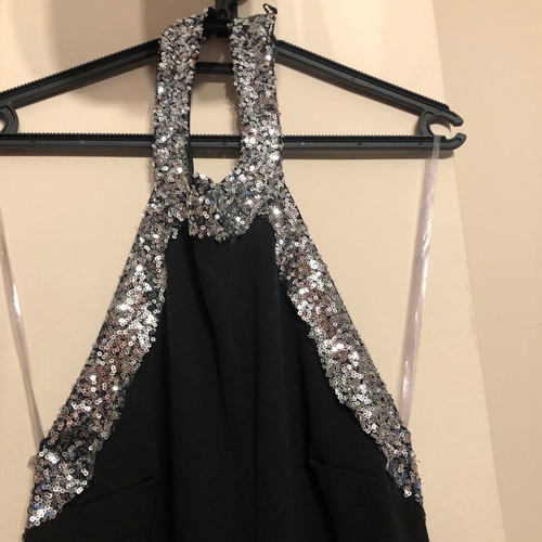 Black one-piece jumpsuit like new with sequin details
