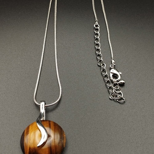 Jewelry set like new, 4 pieces with fish, flowers, heart and tiger eye