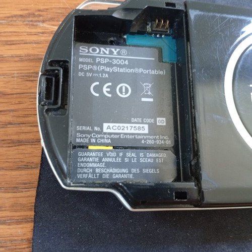 PSP 3000 Console used with charger and FIFA 06 game
