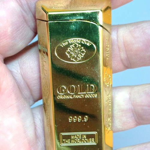 Gas lighter new, shaped like a small gold bar