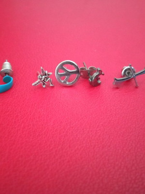 Earrings pack of 7 different designs used, silver color