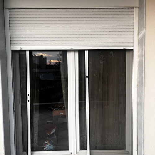Balcony door 1.80x2.40 with roller shutter and screen, like new