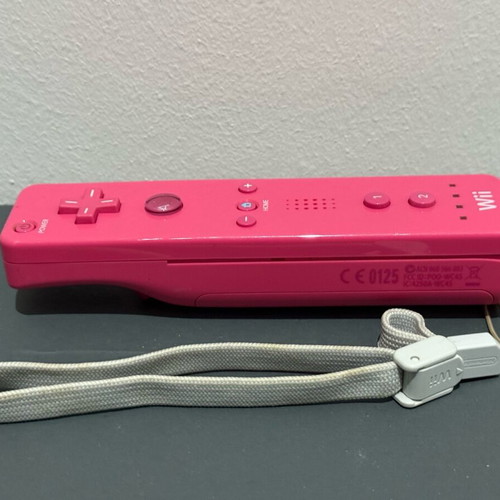 Nintendo Wii controller in pink color like new