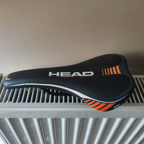 Bicycle saddle for MTB used, 300 grams, slight tear on right side