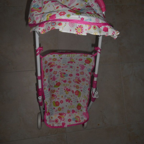 Doll stroller used, dimensions 60x60x25 cm