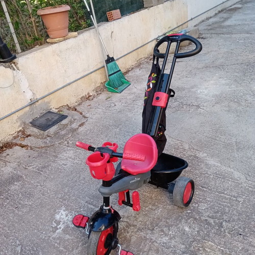 SmarTrike tricycle bike used, red with parent handle