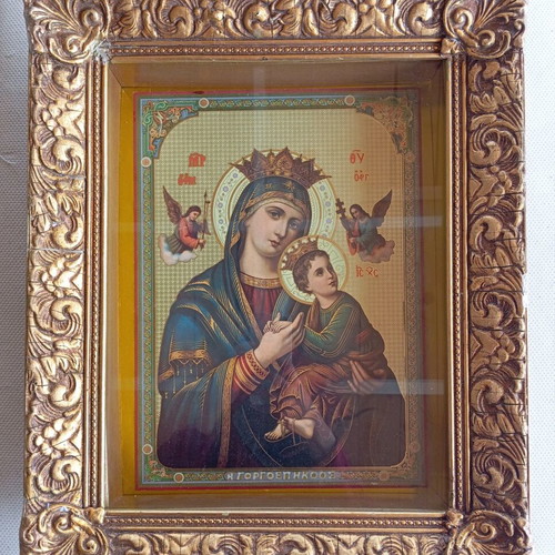 Icon of Virgin Mary and Jesus in used wooden gold frame with glass 43×53
