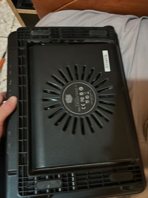 Laptop base compatible with various cables