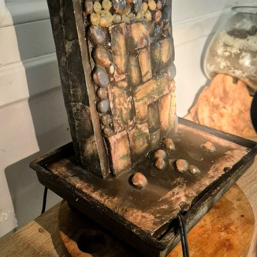 Decorative water fountain used with light