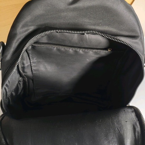 Backpack like new, black, lightweight with multiple pockets