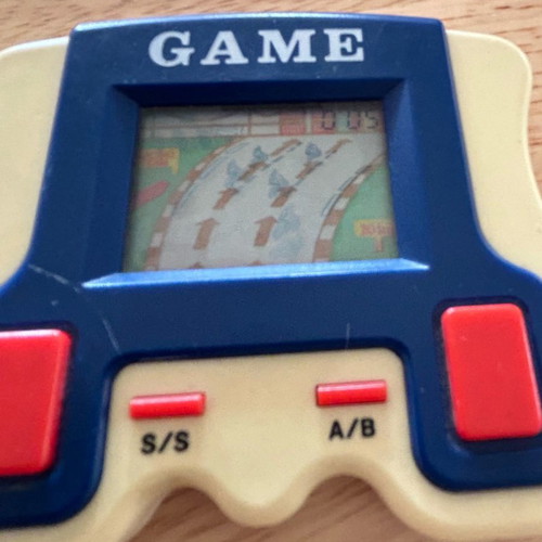 Moto racing handheld game used, vintage 80s collectible