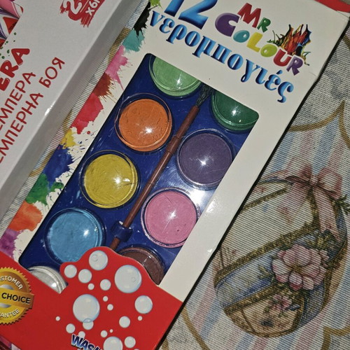 Art supplies like new with tempera, watercolors, plaster, brushes, and color papers