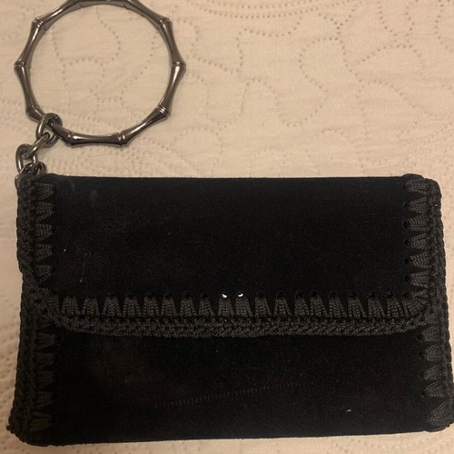 Black suede wristlet bag used