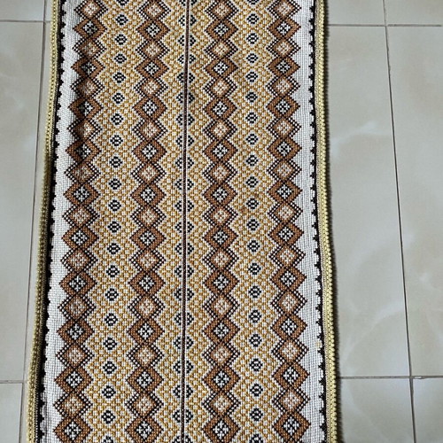 Handmade embroidered table runner used