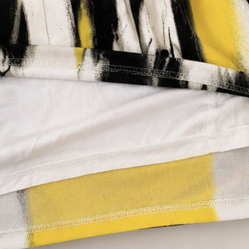 Calvin Klein midi dress like new with black, white and yellow print, size S