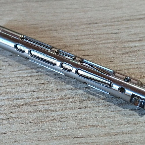 Mini tactical pen with titanium frame like new