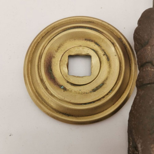Bronze hand door knocker used from 1930 preserved door