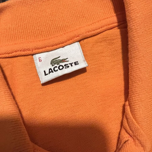 Lacoste polo shirt used, size L, orange