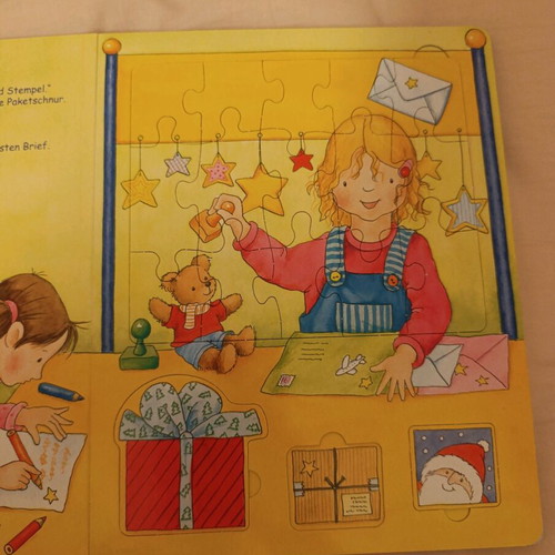 Christmas book with 15-piece puzzle and figures used