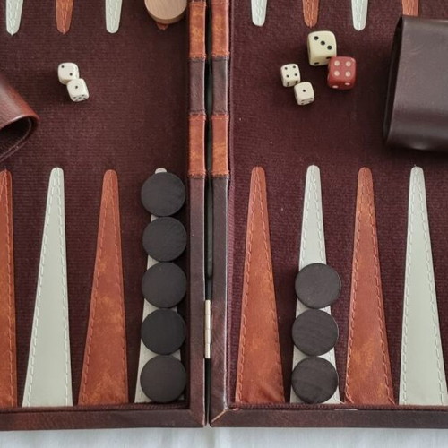 BACKBOARD IN A LEATHER CASE