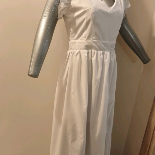 Women's white dress used with open back and nice fit