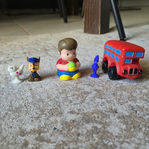 Figures set like new with cat, Paw Patrol dog, plastic boy, purple dog, and bus