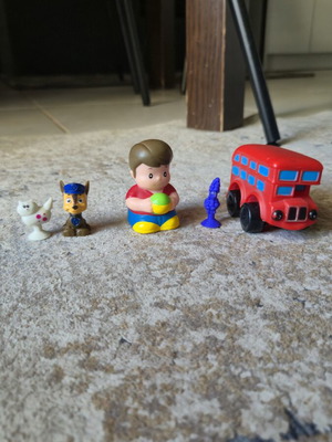 Figures set like new with cat, Paw Patrol dog, plastic boy, purple dog, and bus