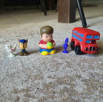 Figures set like new with cat, Paw Patrol dog, plastic boy, purple dog, and bus