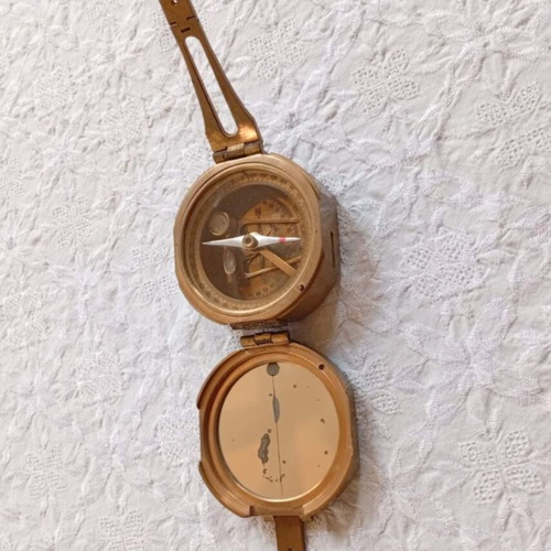 Vintage brass compass used with natural sine table