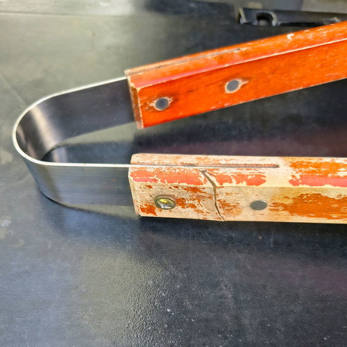 Barbecue set used with stainless steel fork and spatula with wooden handles