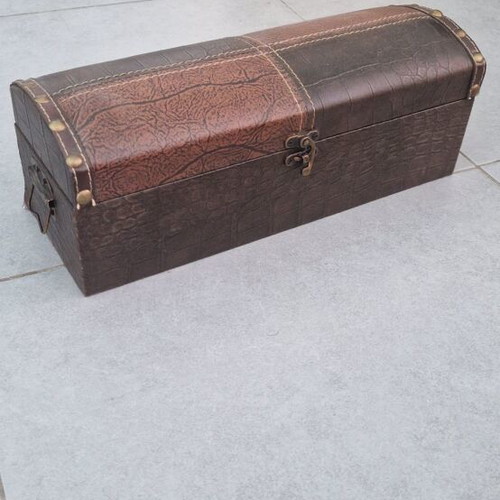 Wooden box with leather-like covering and metal handles