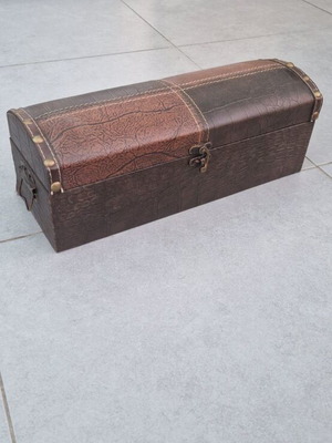 Wooden box with leather-like covering and metal handles