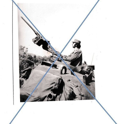 Black and white photo of army technical corps with machine gun and tank