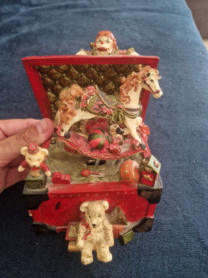 Vintage music box carousel with rocking horse and clown figure used