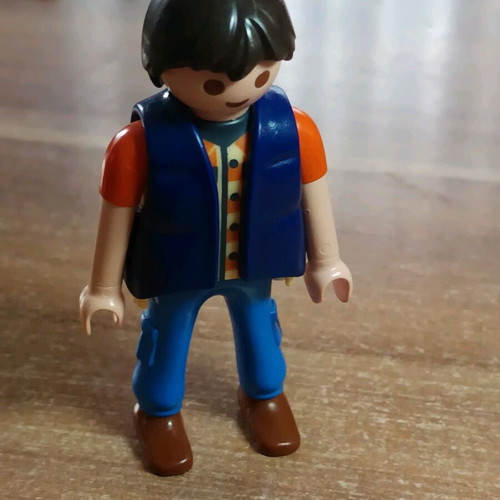 Playmobil figure with vest like new