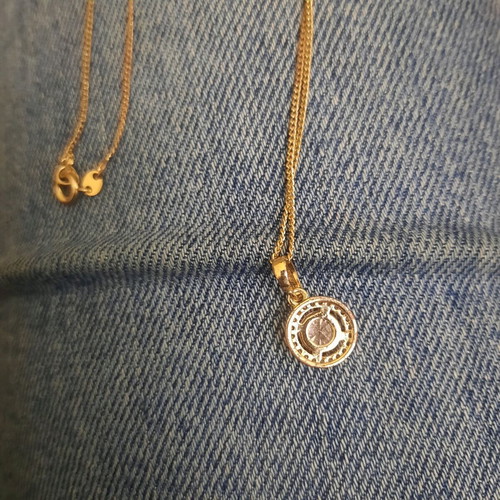 Pendant used in gold tone with stone made of steel