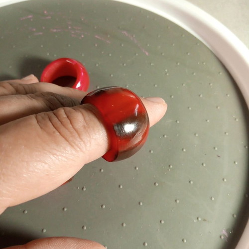 Three fuchsia celluloid rings like new, sizes 8.5, 8.75 and 7.5