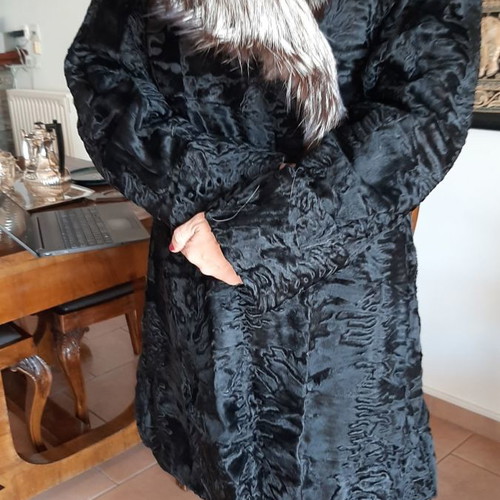 Fur coat used from natural Astrakhan fur with Silver Fox collar