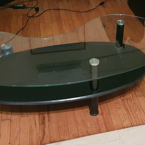 Coffee table used with leather and glass