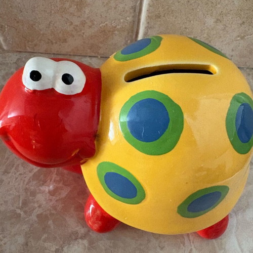 Ceramic snail piggy bank