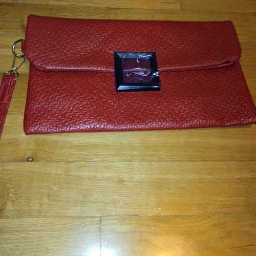 Vintage style red clutch unused with clasp and wrist strap