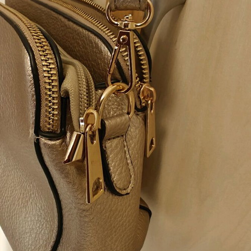 Shoulder bag in metallic gold color like new