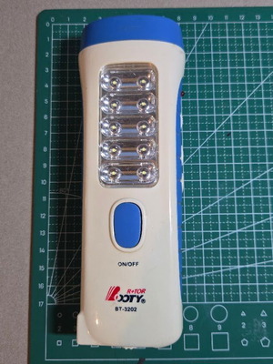 Rechargeable flashlight BT-3202 like new with FM radio and 15 LED