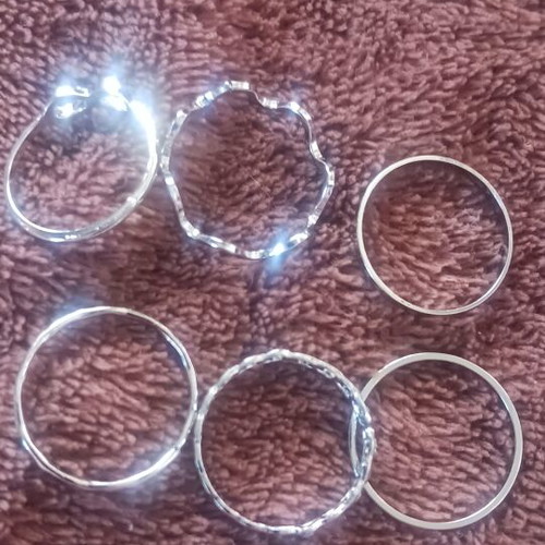 Set of 6 silver rings with different designs